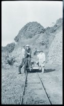 Priests and brothers on railroad handcar near Kalihi Orphange, Kalihi-Uka, Oahu.